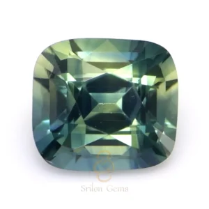 0.58 Carat Cushion Bluish Green Sapphire – Madagascar | Srilon Gems 0.58 ct cushion bluish green sapphire from Madagascar, medium teal color, mixed brilliant cut, eye clean